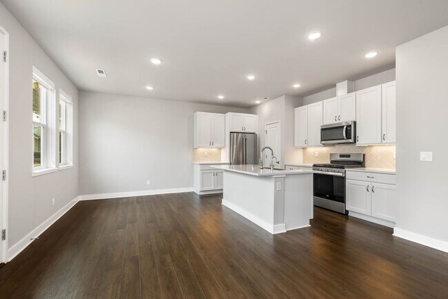 Building Photo - Beautiful River Trail 3 Bedroom Craftsman with Designer Kitchen & Spa-Inspired Primary Suite