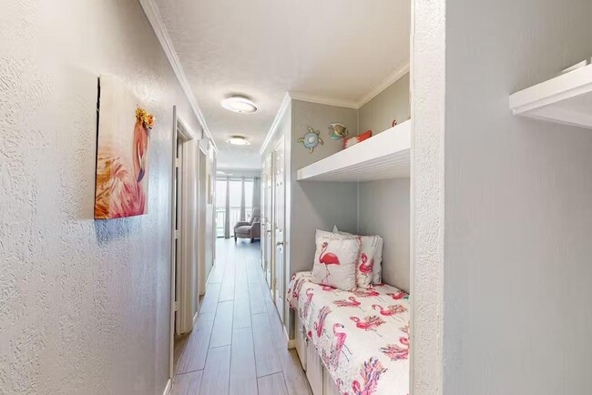 Entrance hallway w/ mud room and day bed and 2 storage closets - 6102 Seawall Blvd