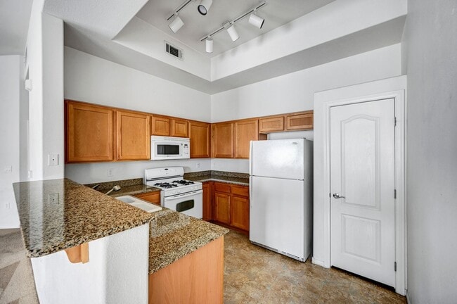 Building Photo - Second Story Condo with Open Floor Plan and Granite Counters
