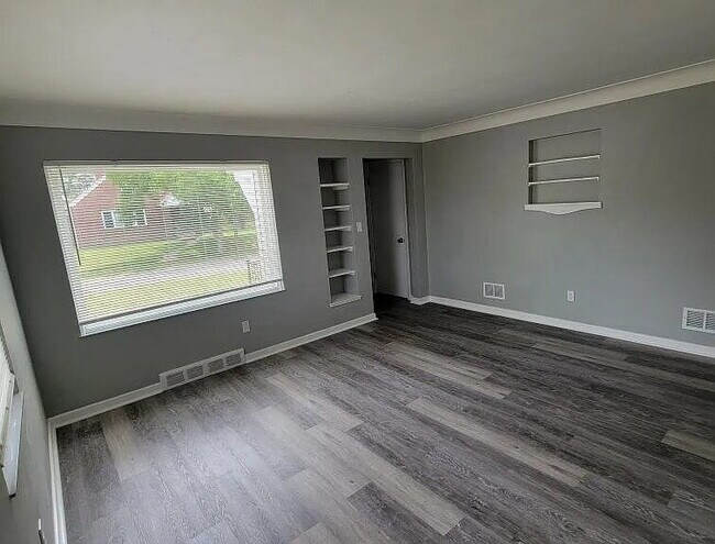 Building Photo - Beautiful Mid-Century home completely updated with two first-floor bedrooms, a spacious second-fl...