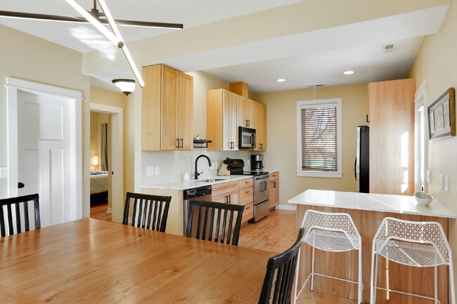 Building Photo - Charming 5-Bed Home with Hardwood Elegance in Minneapolis