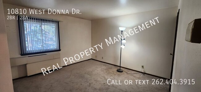 Building Photo - Two Bedroom Upper Condo w/ Utilities Included