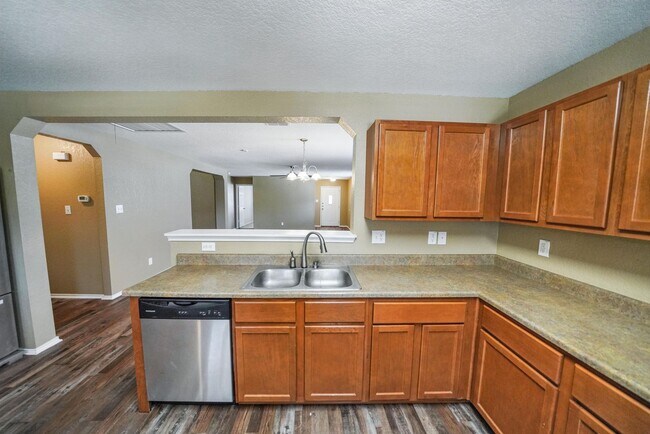 Building Photo - Energy-Smart Single-Story Now Available in...