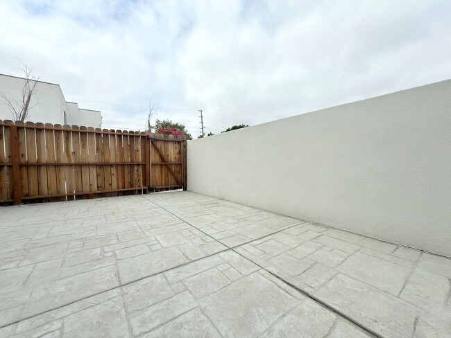Building Photo - Chic Modern Living in Panorama City – 4 Be...
