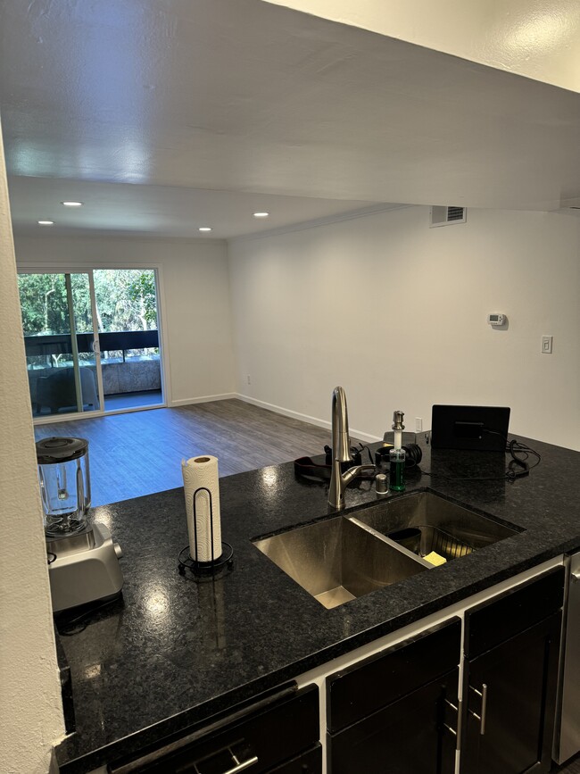 Kitchen Looking into Living Room - 2700 Cahuenga Blvd E