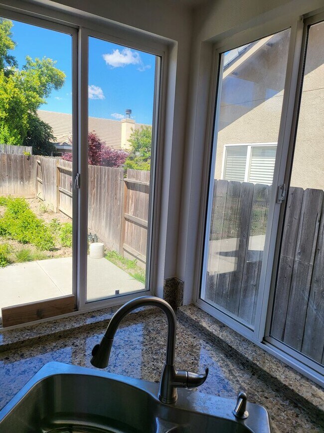 Building Photo - Three Bedroom and Three bathroom home and ...