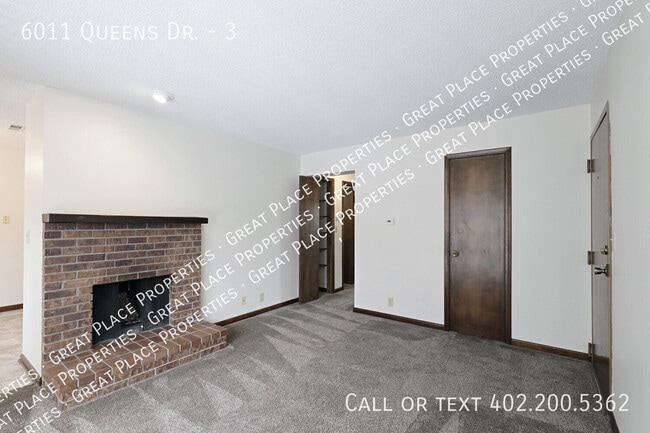 Building Photo - 6011 Queens Dr