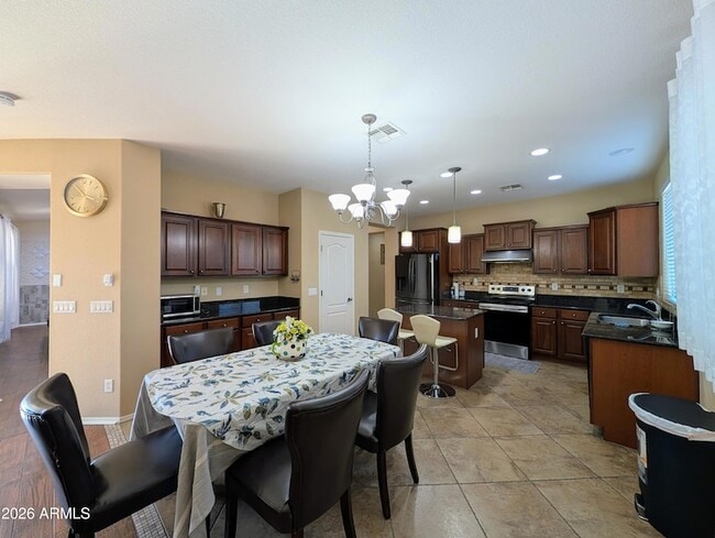 Building Photo - 14309 W Caribbean Ln