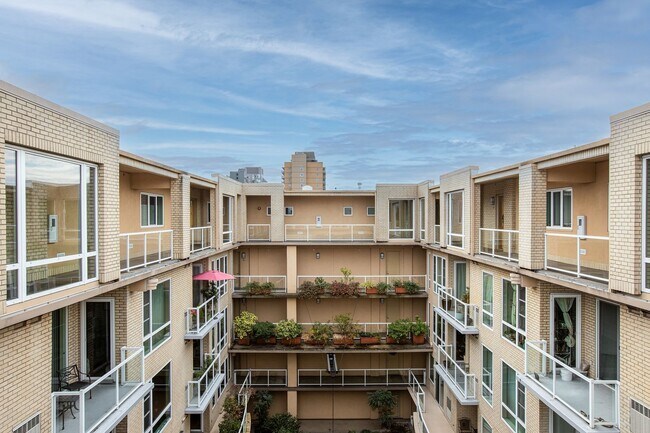 Building Photo - Sweet + secure 1/1 condo with parking, extra storage room + AC available now!