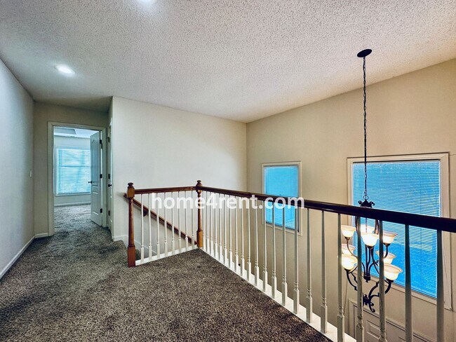 Building Photo - Blue Valley Northwest home on a cul-de-sac w/ granite counters, ss appliances and fenced yard!