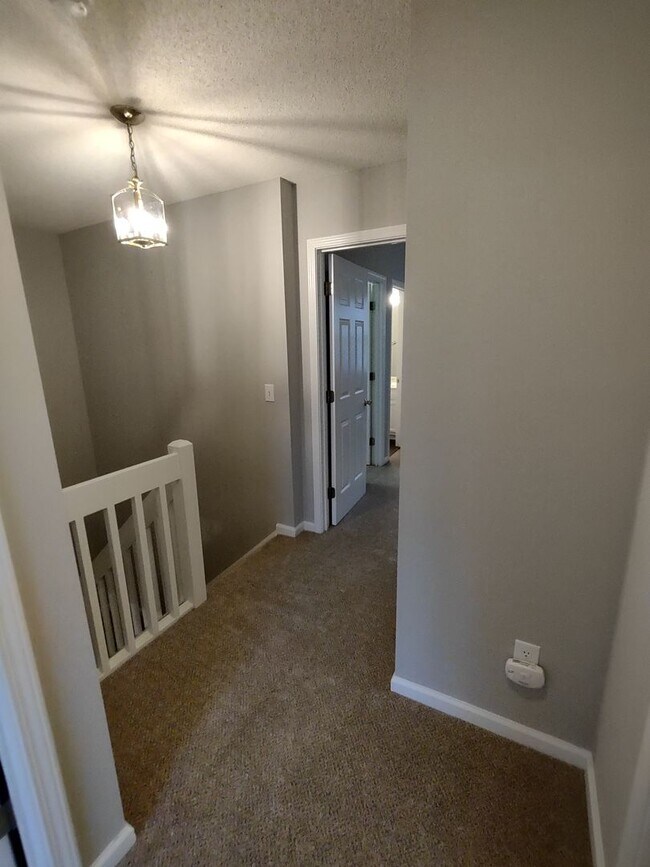 Building Photo - Move In Ready Townhome located in the Pres...