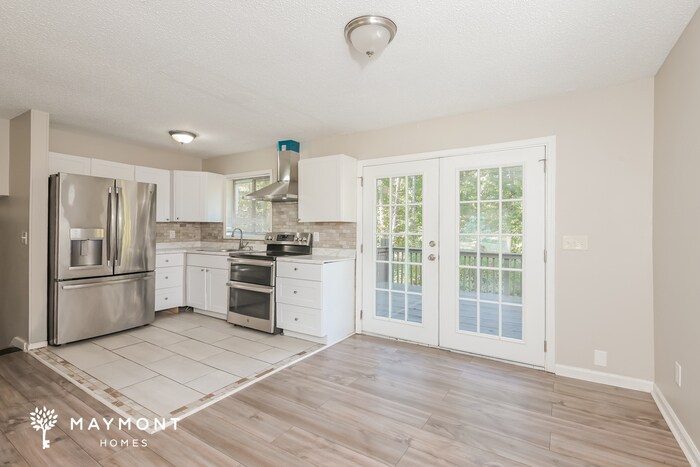 Building Photo - 7050 Merrywood Dr