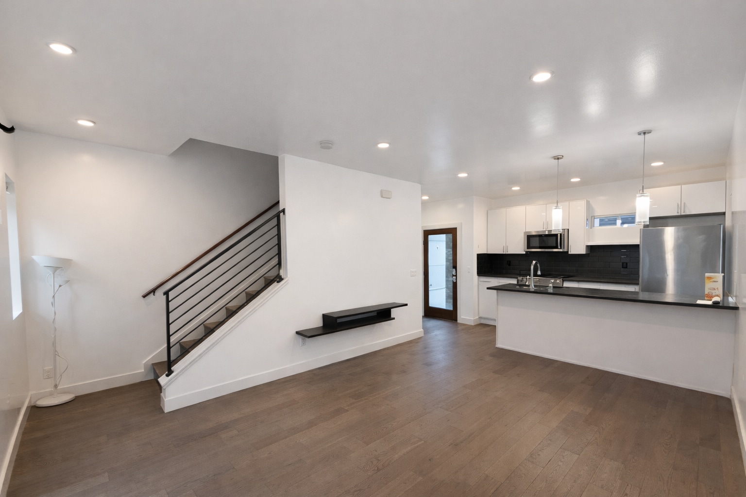 Bright open-concept living with gourmet kitchen. Dining area flows seamlessly from kitchen - 1733 NW 63rd St
