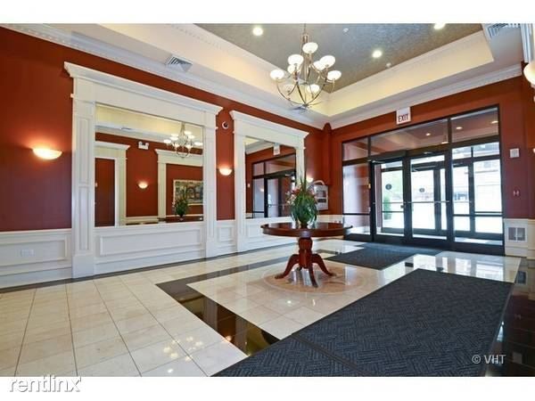 Building Photo - 2 br, 2 bath Condo - 4953 Oakton 208 Unit 208