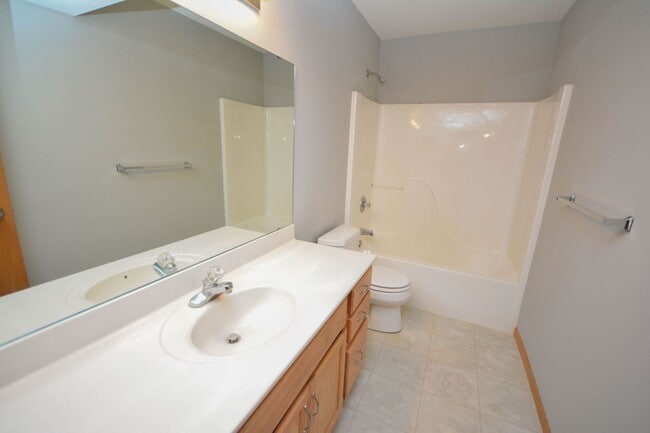 Building Photo - Twin home with walk-out basement & great updates!