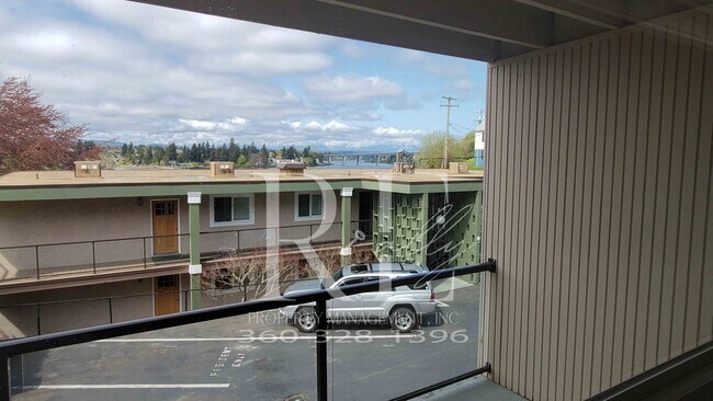 Building Photo - Modern Manette 1BR Condo with Private Pati...