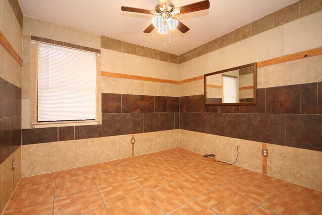 Building Photo - Updated 2BR/1BA Brick Duplex in North Pensacola with Tile Flooring Throughout, Included Utilities...