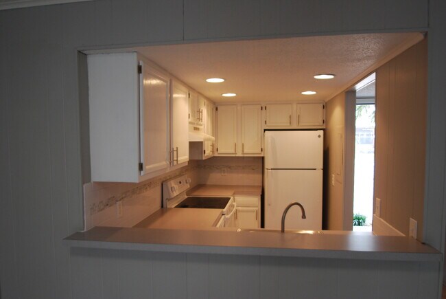 Building Photo - Beach Living at it's Best!  Two Bedroom/On...