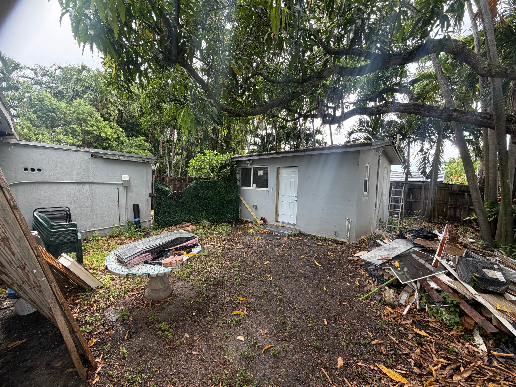 Backyard has been cleaned. old photo. - 13845 NW 6th Ave