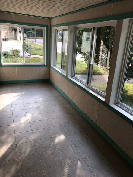 Enclosed sun porch - 20 Highwood Ave