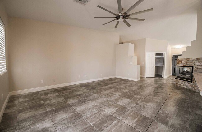 Building Photo - STUNNING 3 Bedroom Home with a 3 CAR GARAGE & RV PARKING!