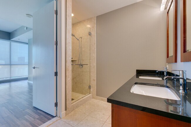 Building Photo - Iconic Strip-View Luxury | Elegant 1BR + Den High-Rise Residence