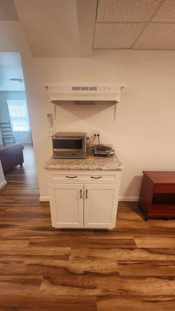 Building Photo - West AVL - Furnished Basement Efficiency
