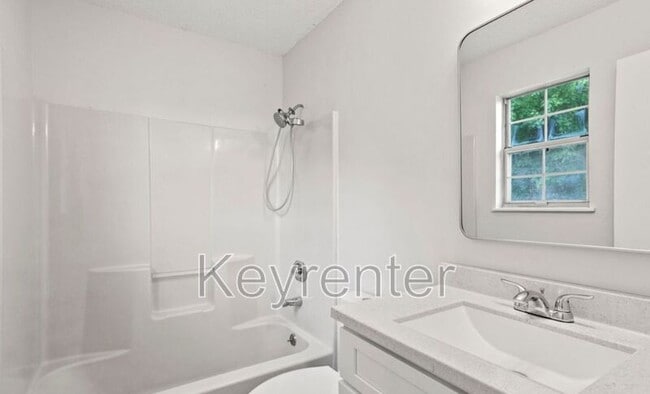 Building Photo - 6600 Woodcock Cir