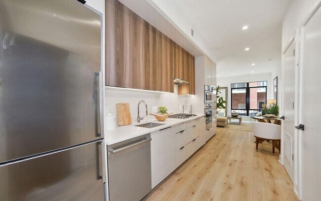 Building Photo - One Bedroom Condo in the Heart of the City + Rooftop Deck **Half Month Free on 12 Month Lease**