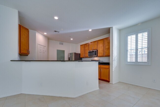 Building Photo - Green Valley!! Gated!! 4 Bedrooms!! Bed & Bath Downstairs!!  TANKLESS WATER HEATER!!! Covered pat...