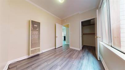 Building Photo - Top-Floor 3BR with Renovated Kitchen Acros...