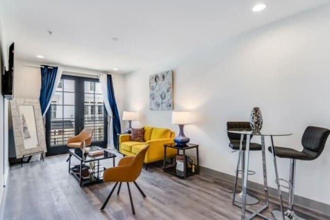 Building Photo - Modern Living Meets Walkable City Charm in...