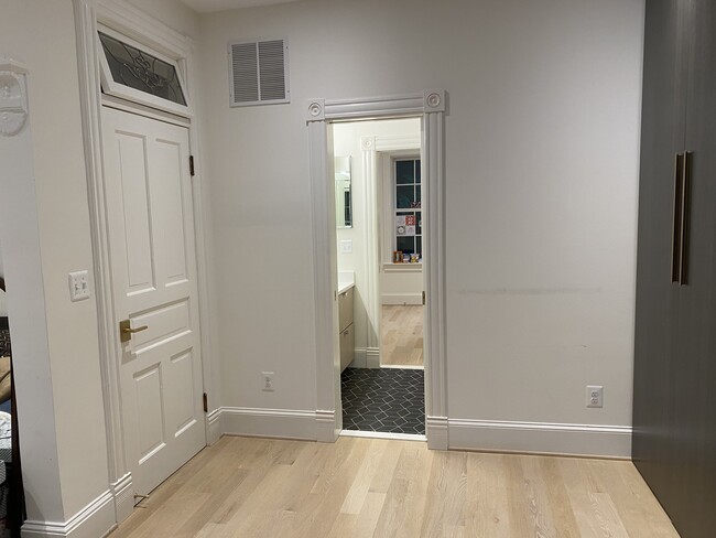 Second floor bedroom, jack and jill bath and view to third bedroom - 1808 Riggs Pl NW