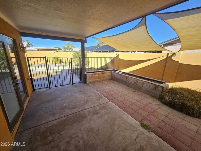 Building Photo - 1320 W Pecos Ave