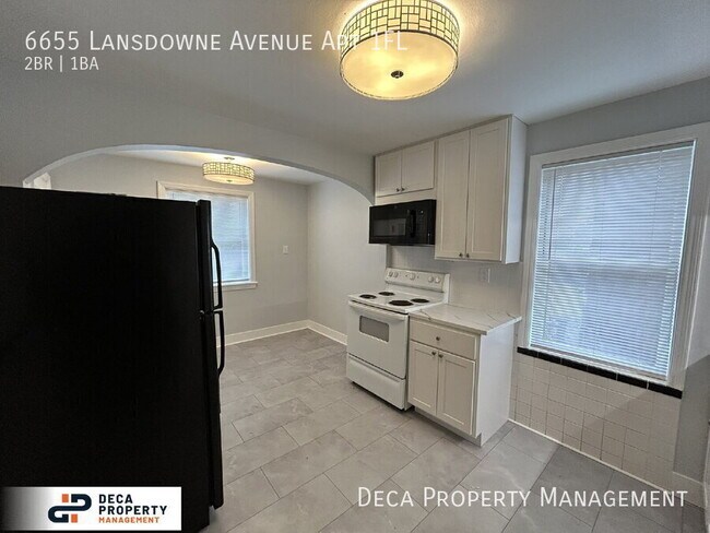 Building Photo - 6655 Lansdowne Avenue Apt 1FL-