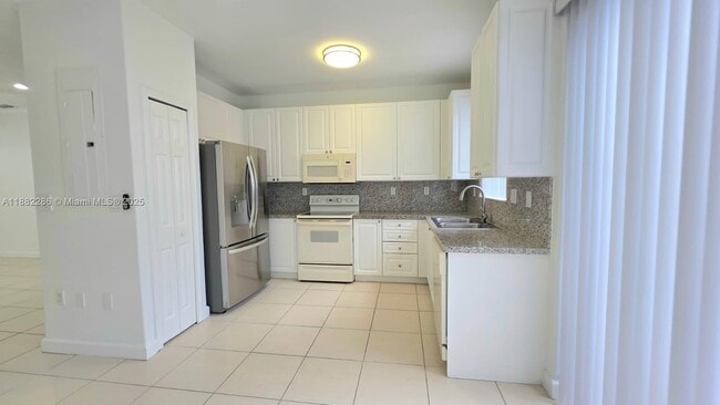 Building Photo - 5570 NW 107th Ave