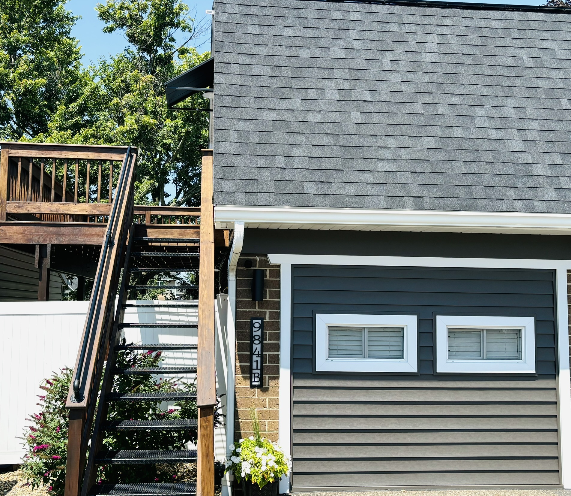 Parking in front of unit beside entry stairs - 9841 Cleveland Ave NW