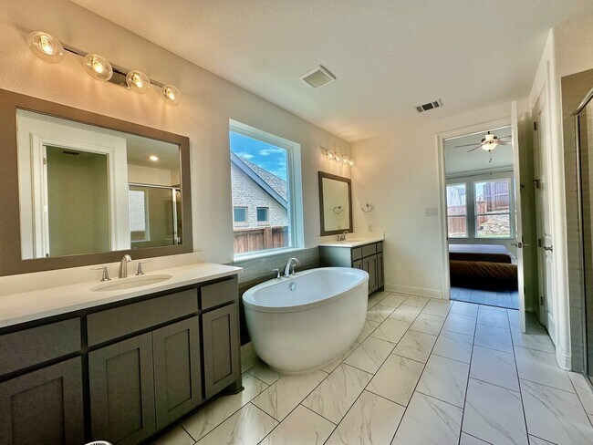 Building Photo - Stunning 4BR/3.5BA Modern Home in Walsh — Available 7/21
