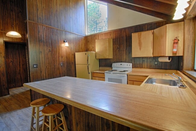 Building Photo - LONG-TERM RENTAL: Upper Floor Unit in Duplex with Washer/Dryer & Wood Stove!