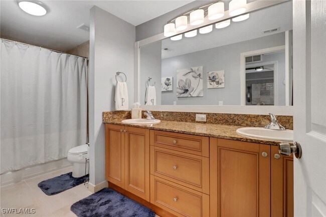 Building Photo - 10126 Villagio Palms Way