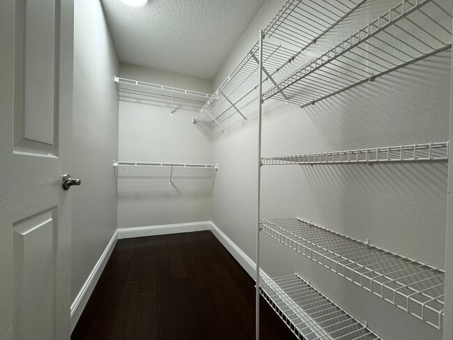 Building Photo - Oviedo 2/2 Condo with Tile & LVP Flooring, Updated Baths, New Paint & Appliances!