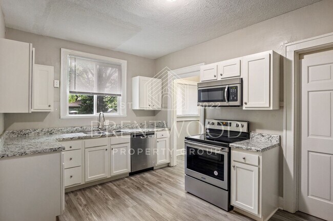 Building Photo - Updated and Move-In Ready 4-Bedroom Home