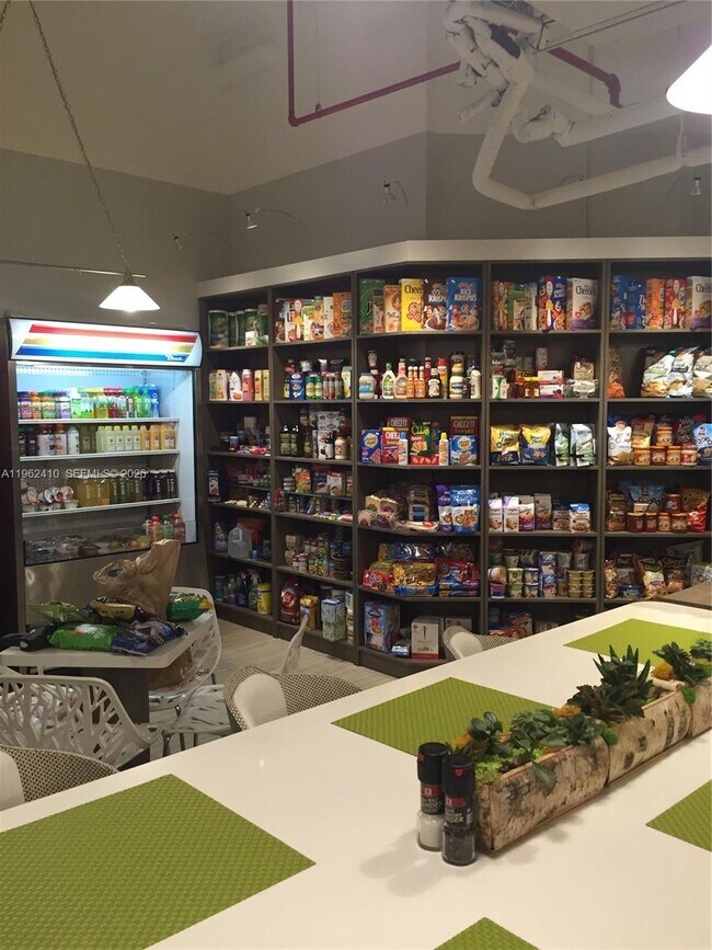 Building Photo - 10275 Collins Ave