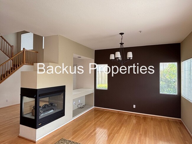 Building Photo - Great two-level home in Las Palmas II with scenic views