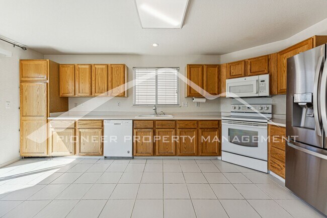 Building Photo - Spacious Home with Fenced Yard and Central AC