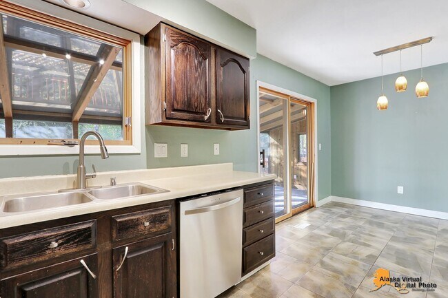 Building Photo - Eagle River Home w/ Fenced Yard, Sunroom, and Garage!