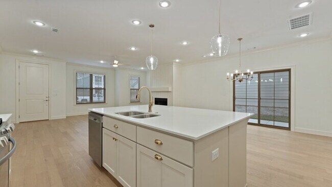 Building Photo - "Spacious 4-Bedroom Retreat with Fireplace on West Bronco Drive – Fayetteville's Hidden Gem!"