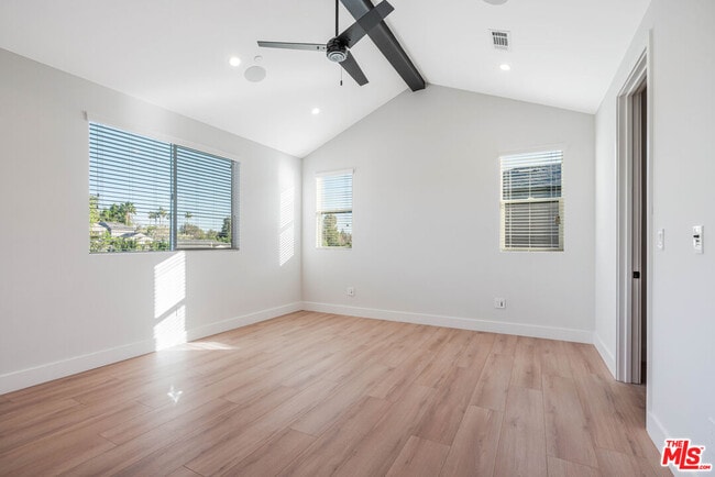 Building Photo - 8670 Encino Ave