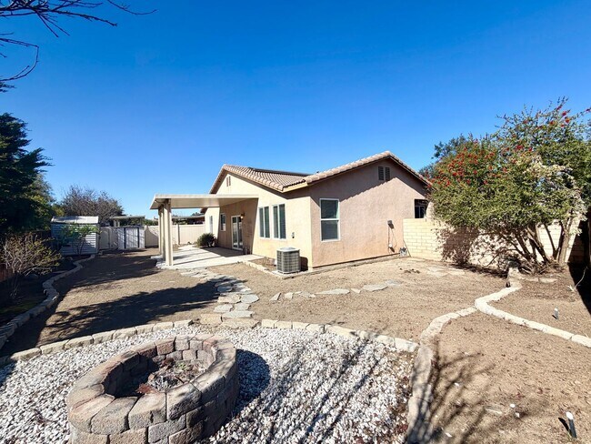 Building Photo - Energy Efficient 5 Bedroom Home with Paid Solar & Covered Patio