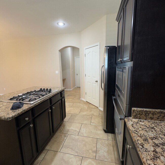 Building Photo - 4 Bedrooms, 3 Baths, a Pool, and Solar Panels!